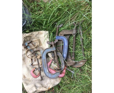 A bag of vintage clamps