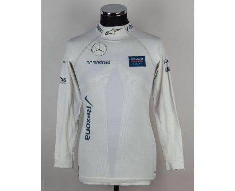 This Felipe Massa Williams Martini Racing Race Used Nomex Top, is a rare and authentic item worn by the talented Brazilian dr