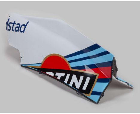 Own a rare and fascinating piece of Formula 1 history with this Williams Martini Racing Race Used Engine Cover Spine, an auth