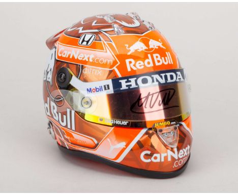 This Max Verstappen 2022 Red Bull 1:2 Signed Helmet is an exceptional collector's item, celebrating the Dutch driver's monume