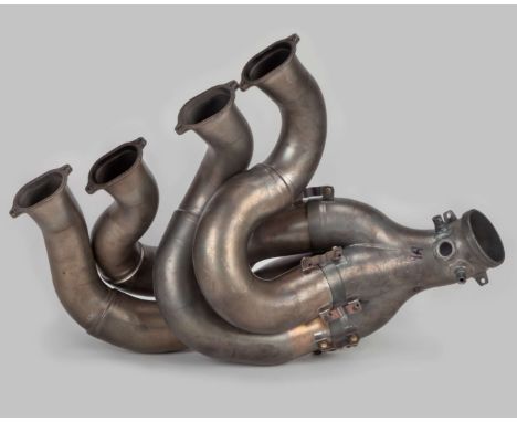 Red Bull Racing 2013 RB9 Race Used Exhaust Bank, powered by the formidable Renault V8 engine.&nbsp;The 2013 RB9 was a critica