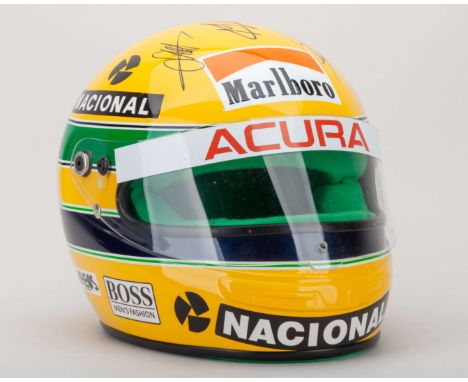 This exceptional replica helmet honours the legendary Ayrton Senna and his iconic 1990 Formula 1 World Championship victory w