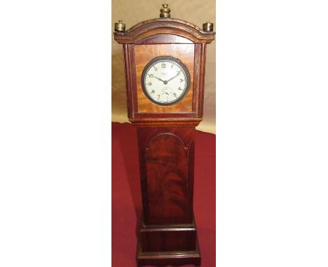 Early C20th pocket watch stand in the form of a Geo. III mahogany long case clock, complete with Smith's Empire pocket watch 