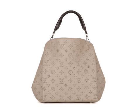 Louis Vuitton, a Mahina Babylon handbag, featuring a perforated monogram beige leather exterior, polished silver-tone hardwar