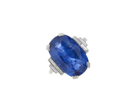 An Art Deco platinum Sri Lankan sapphire single-stone dress ring, with rectangular-shape diamond stepped sides, verbal report
