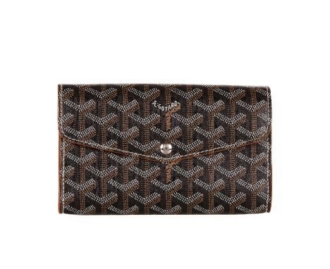 Goyard, a Goyardine wallet, featuring the maker's signature geometric hand-painted Goyardine design onto a black coated canva