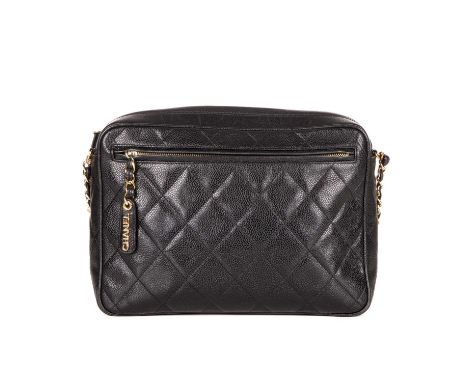 Chanel, a vintage large caviar camera bag, designed with a diamond quilted black caviar leather exterior, with gold-tone hard