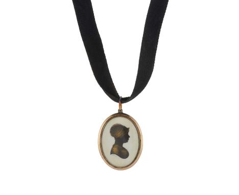 John Miers, a late Georgian gold silhouette pendant, suspended from a black cord, with hairwork reverse, pendant signed Miers