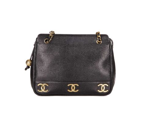Chanel, a vintage caviar leather handbag, crafted from black caviar leather with gold-tone hardware, featuring CC logo plaque