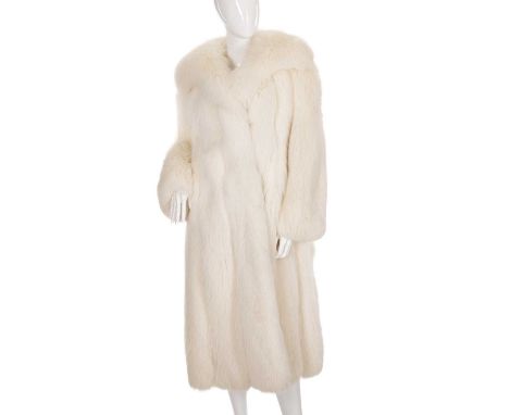 A full-length arctic fox fur coat, featuring a wide notched lapel collar, button loop fastenings, two outer pockets and one i