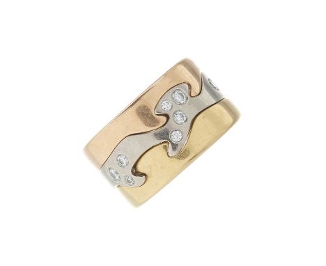 Georg Jensen, an 18ct tri-colour gold diamond Fusion puzzle ring, estimated total diamond weight 0.15ct, G-H colour, VS clari