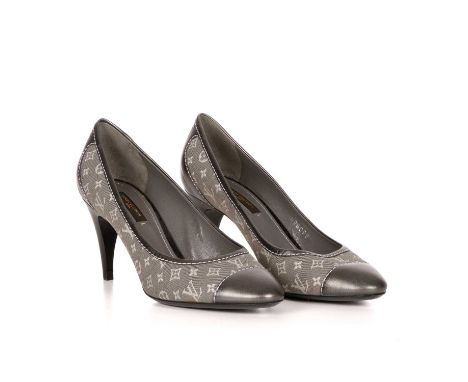 Louis Vuitton, a pair of monogram heeled pumps, featuring the maker's monogram canvas uppers, with metallic silver leather to