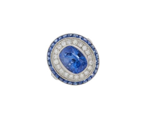 A platinum sapphire and single-cut diamond cluster dress ring, with calibre-cut sapphire surround, total sapphire weight 4.33
