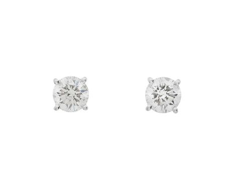 A pair of 18ct gold brilliant-cut diamond single-stone stud earrings, estimated total diamond weight 0.90ct, J-K colour, SI2-