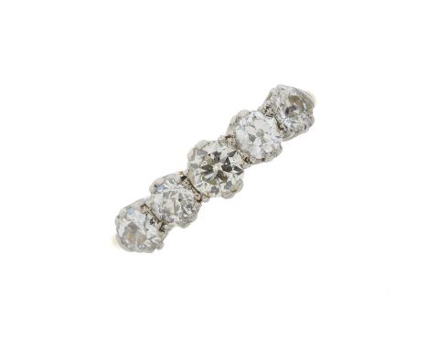 A mid 20th century 18ct gold and platinum, graduated old-cut diamond five-stone ring, estimated total diamond weight 1ct, I-K