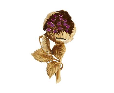 An 18ct gold pink sapphire flower brooch, import marks for Birmingham, 1986, length 5.1cm, 22.6gOverall good conditionRubies 