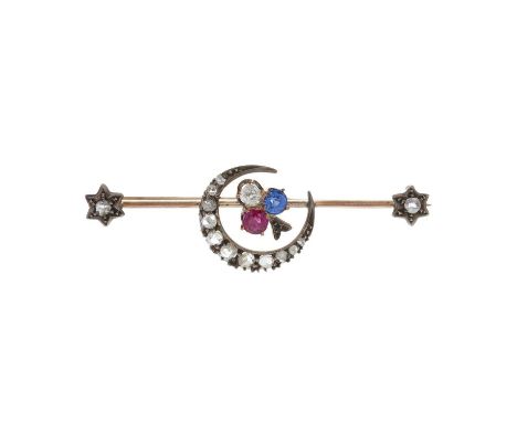 A late Victorian gold and silver, ruby, sapphire and old-cut diamond shamrock brooch, with rose-cut diamond crescent surround