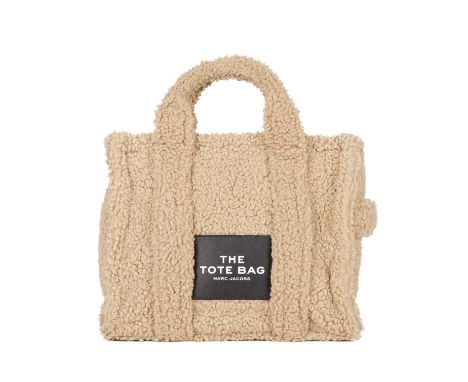 Marc Jacobs, a Medium Teddy Tote, crafted from beige teddy fabric with black leather trim, featuring dual top handles, a deta