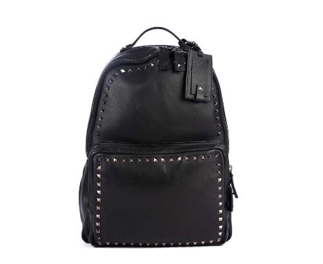 Valentino, a Rockstud backpack, crafted from smooth black leather, featuring a pyramid studded trim, with a front patch pocke