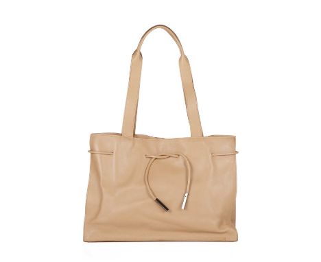 Gucci, a vintage leather handbag, designed with a tan leather exterior with draw-cord detailing, dual leather top handles, ma