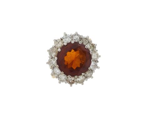 An 18ct gold fire opal and brilliant-cut diamond cluster ring, fire opal estimated weight 3ct, estimated total diamond weight