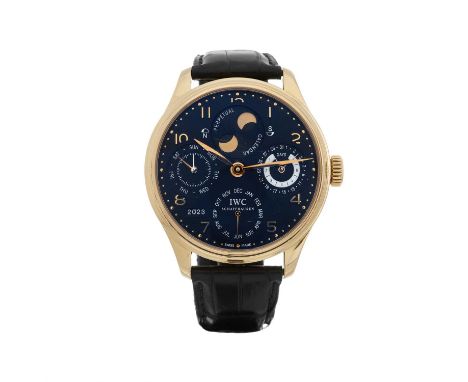 IWC, an 18ct rose gold Portuguese Perpetual Calendar Double Moon wrist watch, black dial, exhibition case back, reference 502