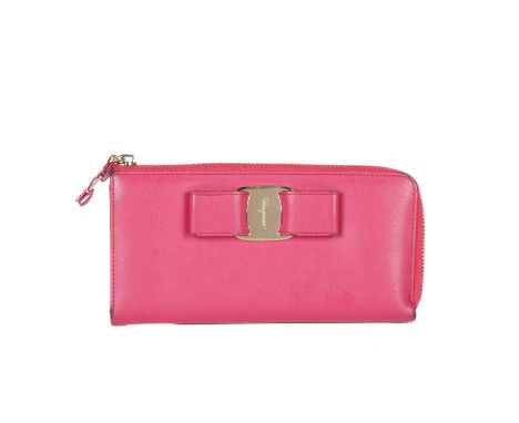 Salvatore Ferragamo, a Vara Bow long wallet, crafted from smooth fuchsia pink leather, featuring front bow details with an en