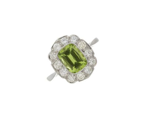 A platinum peridot and diamond cluster ring, peridot estimated weight 1.50ct, estimated total diamond weight 0.55ct, I-K colo