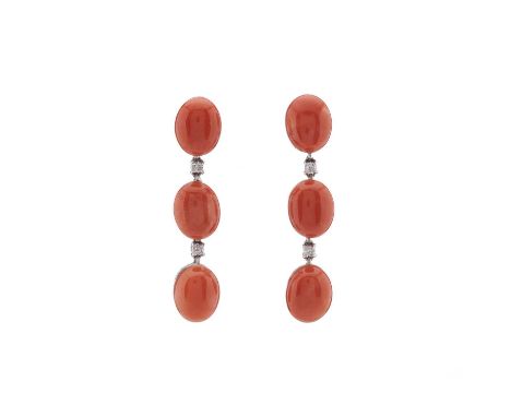 A pair of 18ct gold oval coral cabochon three-stone articulated drop earrings, with brilliant-cut diamond spacers, corals mea