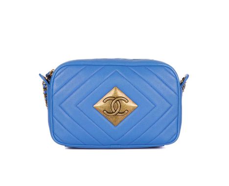 Chanel, a Pyramid camera bag, featuring a blue diamond-quilted leather exterior, with aged gold-tone hardware to include and 