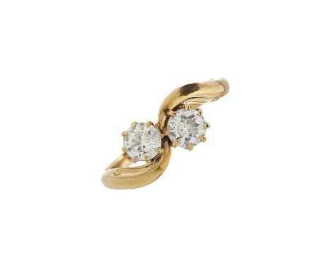 A late Victorian 18ct gold old-cut diamond two-stone crossover ring, estimated total diamond weight 0.65ct, H-I colour, SI cl