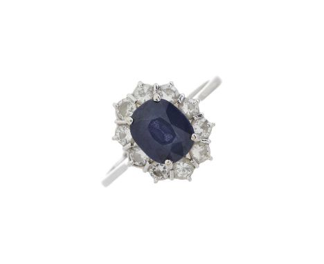 An 18ct gold sapphire and diamond cluster ring, estimated total diamond weight 0.50ct, H-I colour, VS clarity, import marks f