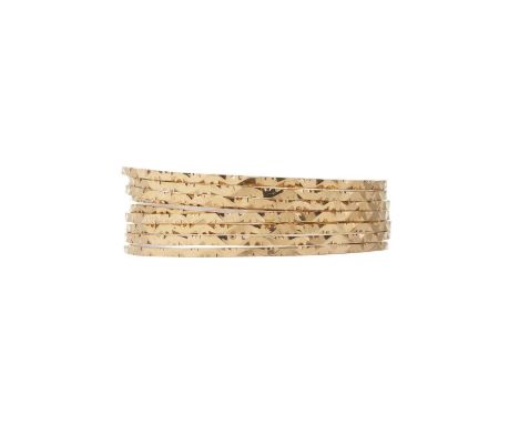 A selection of nine 18ct gold bangle bracelets, inner diameter 6.5cm, 85.7gOverall good conditionWidth of bangles 0.2cmLight 