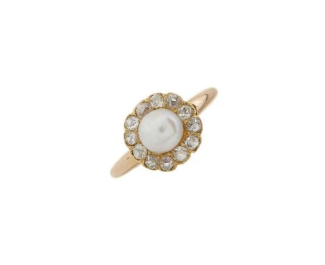 An early 20th century gold pearl and old-cut diamond cluster ring, pearl measures approximately 5.6mm, estimated total diamon