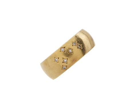 An 18ct gold diamond accent band ring, ring size R, 14.4gOverall good conditionWidth of band 0.8cmDiamonds are well matched, 