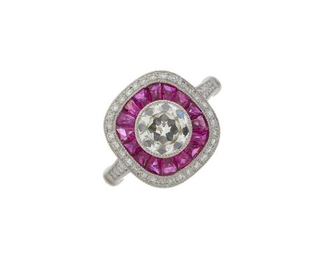 A platinum circular-cut diamond and calibre-cut ruby cluster dress ring, with single-cut diamond surround and shoulders, tota