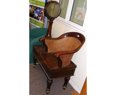 A Victorian mahogany bergere jockey scale chair by Henry Pooley &amp; Sons, Liverpool