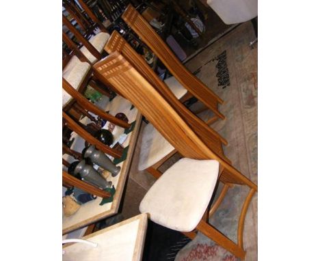 A stoneware dining table on square base - length 170cms, together with the set of six light oak rail back dining chairs