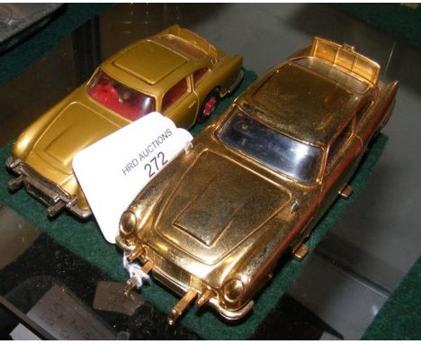 A Corgi Aston Martin DB5 model car, together with a James Bond Aston Martin DB5 