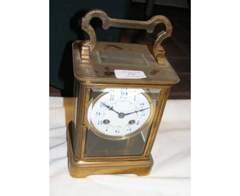 A large brass cased carriage clock - 22cms high
