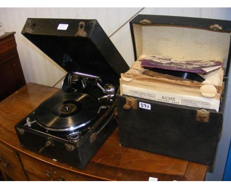 A Columbia picnic gramophone, together with a box of shellac records 