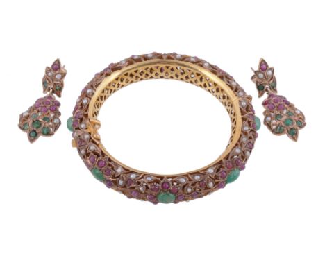 A multi gem bangle and ear pendants  , the Indian style bangle set with oval cabochon emeralds within a surround of circular