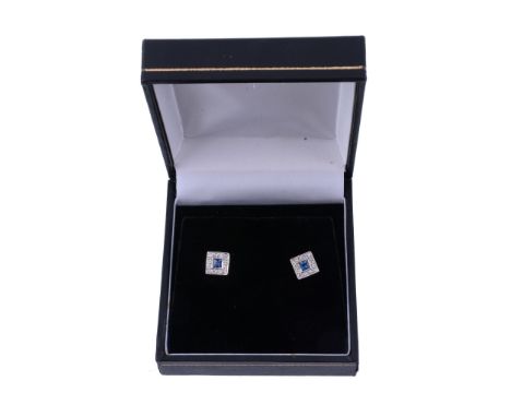  A pair of sapphire and diamond ear studs,   the central square shaped sapphire within a surround of eight cut diamonds, stam