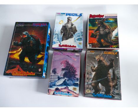 This is a set of KAIJU MODEL KITS made in JAPAN by BANDAI in the 1980's. All are 1/350 scale and unused with the exception of