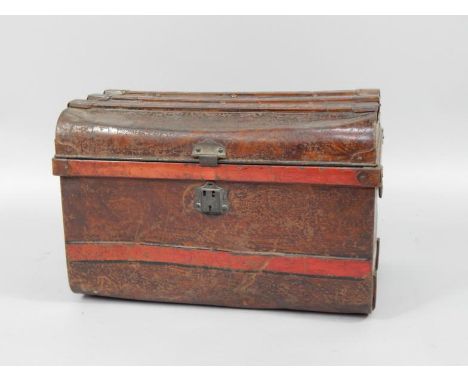 A tin trunk, 63cm x 41cm x 41cm.