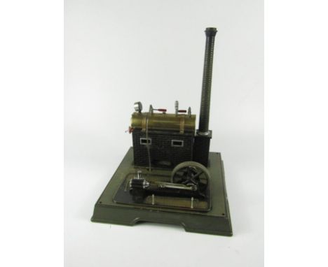 A Marklin brass and tin steam engine, raised on a square base, bears plate to side, No 6, 30cm x 30cm x 38cm.
