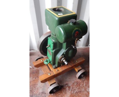 An early 20thC Ruston and Hornsby stationary engine water pump no. PT178B, in green and yellow with printed badge and articul