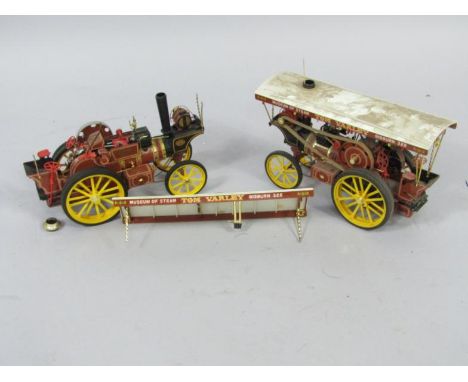 A Tom Varley Museum of Steam scratch built model of a traction engine, with articulated wheels, 32cm high, and another plasti