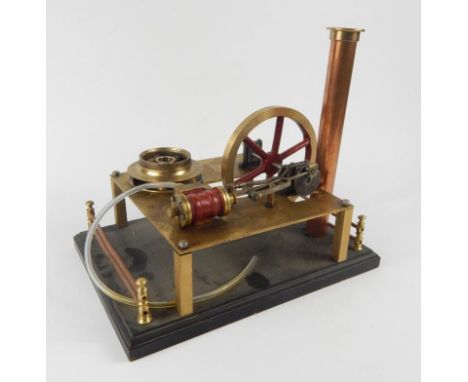 A scratch part built live steam table top engine, with 14cm dia. part pierced drive wheel, on a platform stand with cylindric