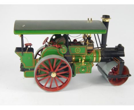 A model of a steam traction engine roller, 1:16 scale kit by Bandai, 18cm high, 31cm wide, 11cm deep.